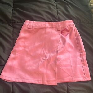 Asymmetrical pink satin skirt